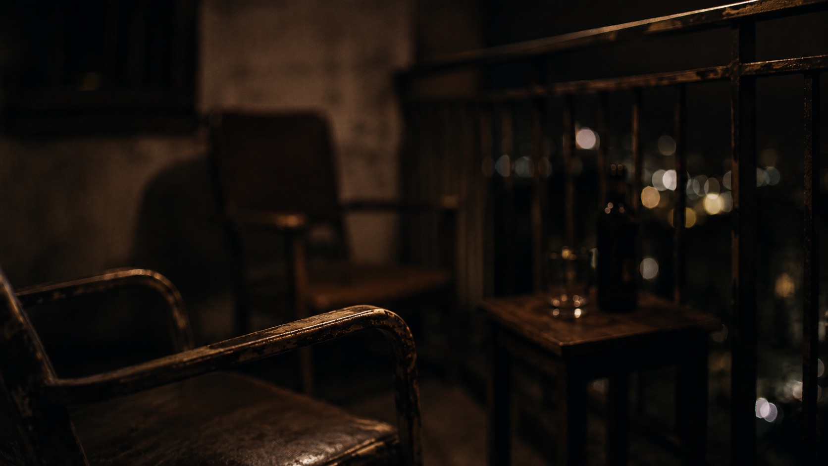 A dark, quiet scene matching an essay on emotional pain, avoidance, and healing.